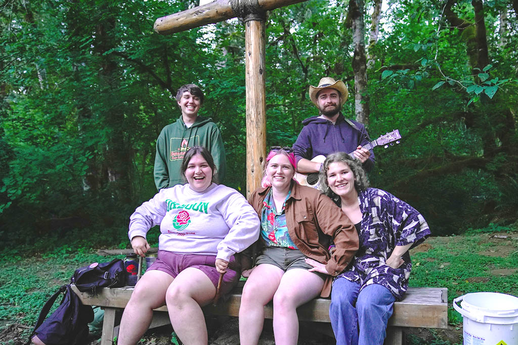 Summer 2022 staff members at lower campfire
