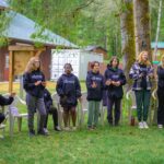 Group of Compass campers singing at morning gathering